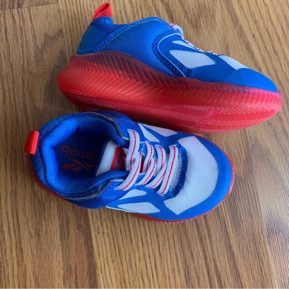 Toddler size 5 light-up Reebok tennis shoes